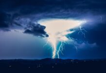 Why Does Light Slow Down in Water?